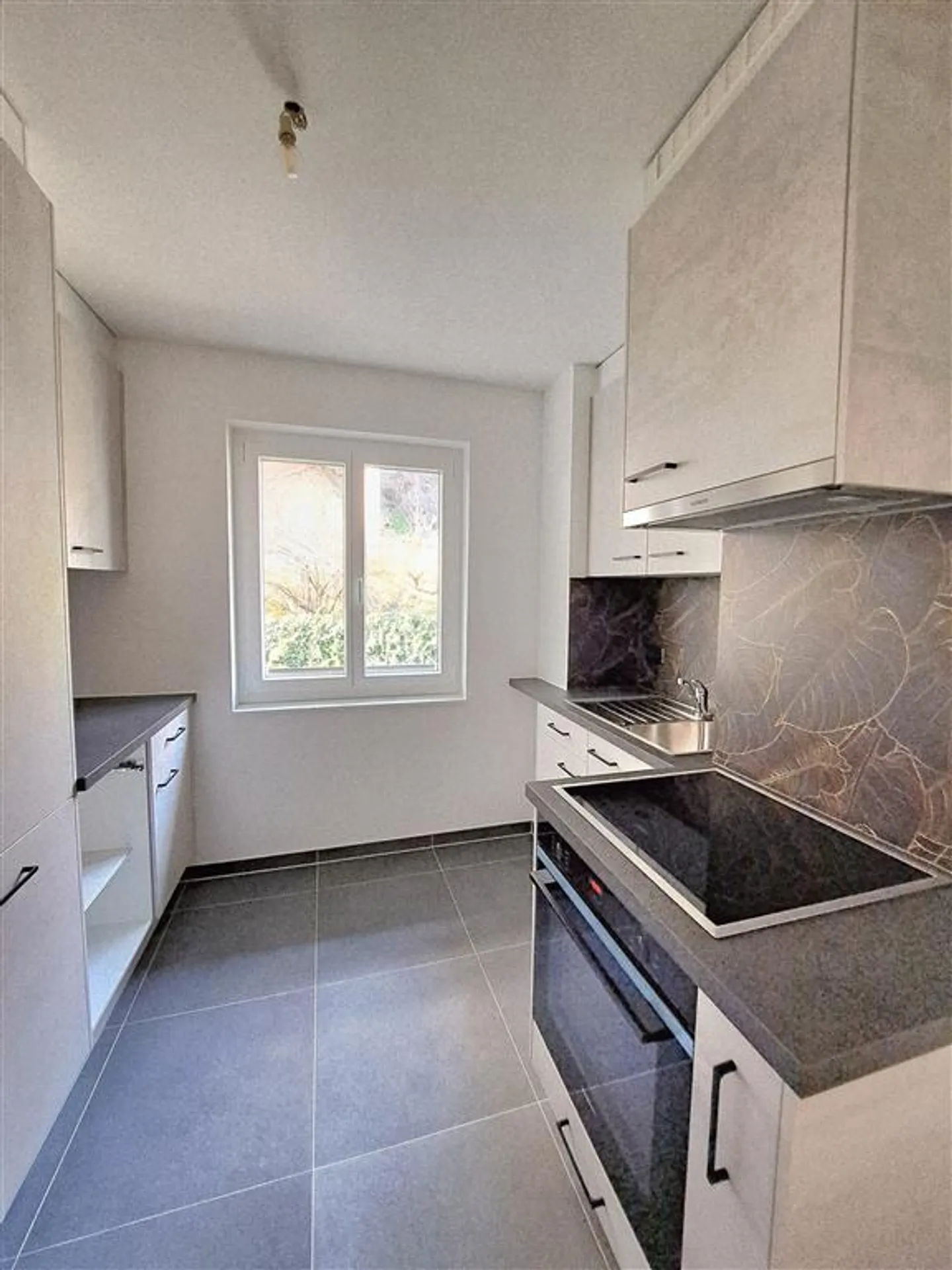 Charmant appartement 3.5 pièces - Photo 8 sur 9