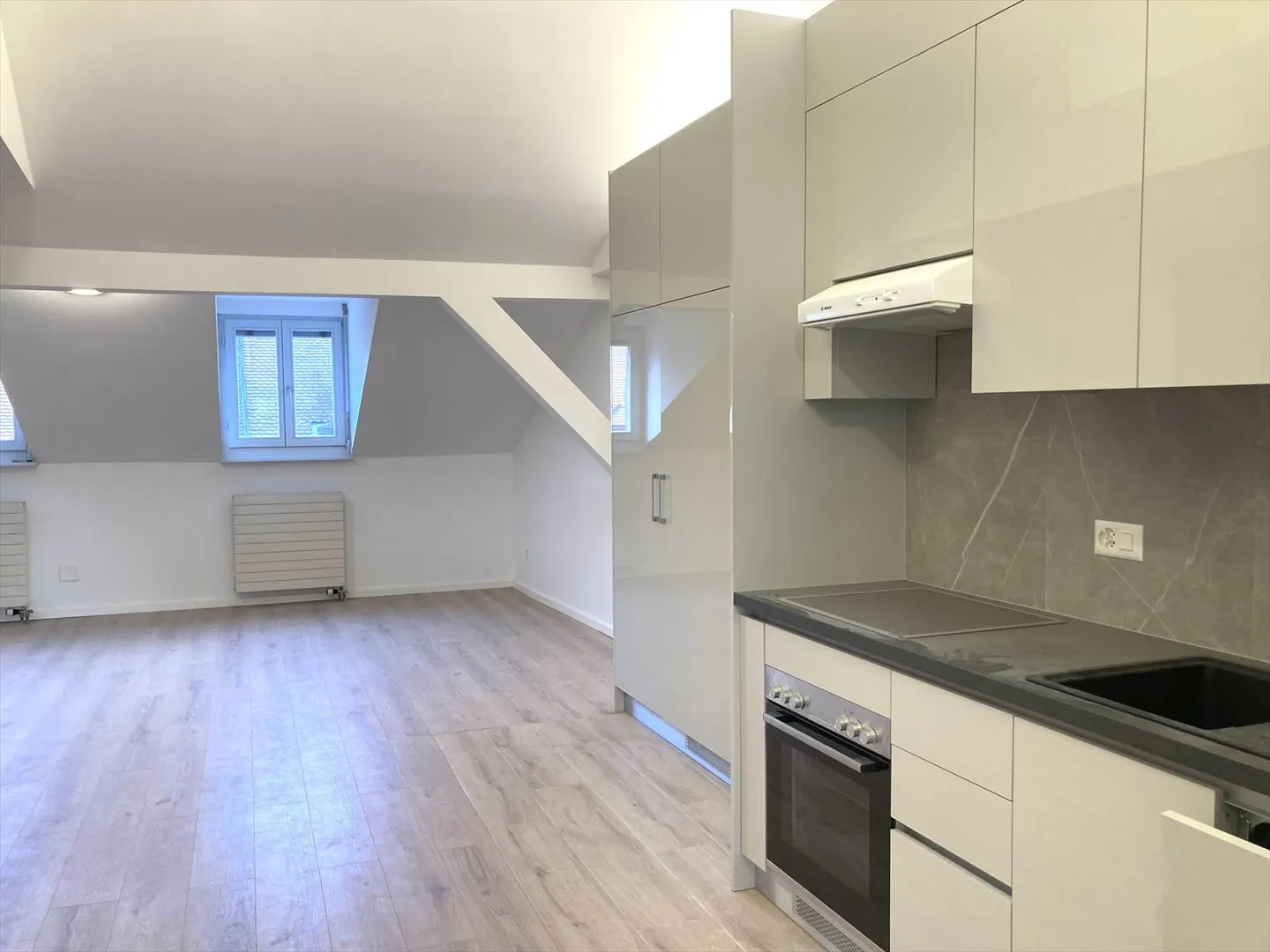 Dernier étage 2.5 pièces - Photo 10 sur 11