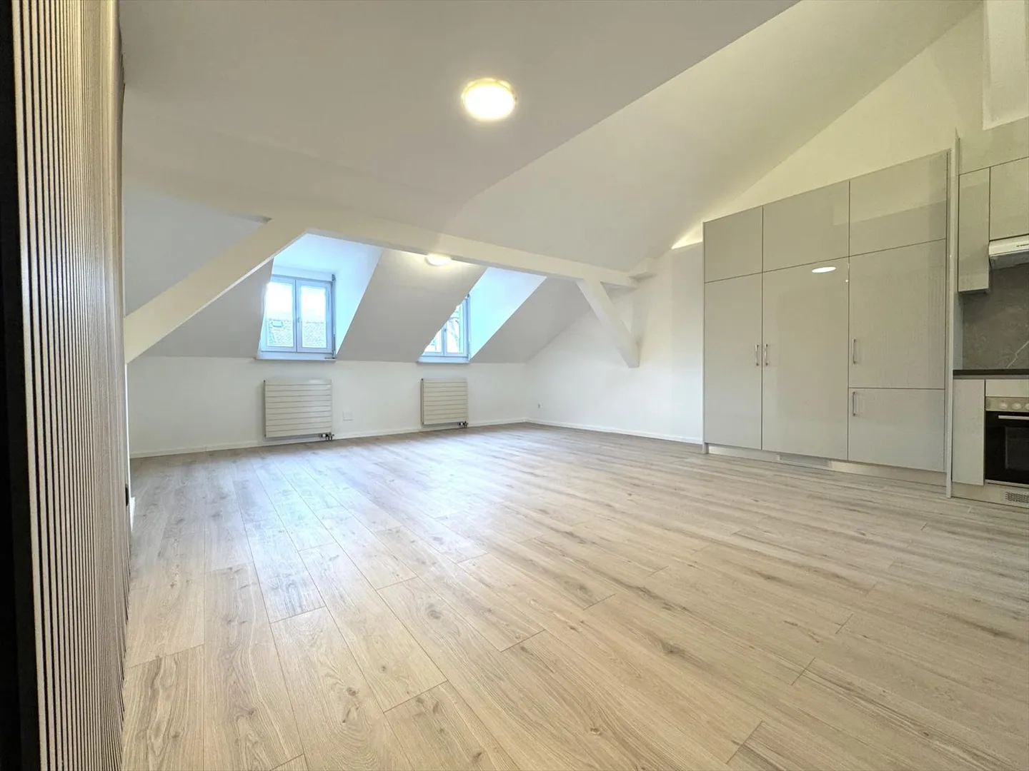 Dernier étage 2.5 pièces - Photo 1 sur 11