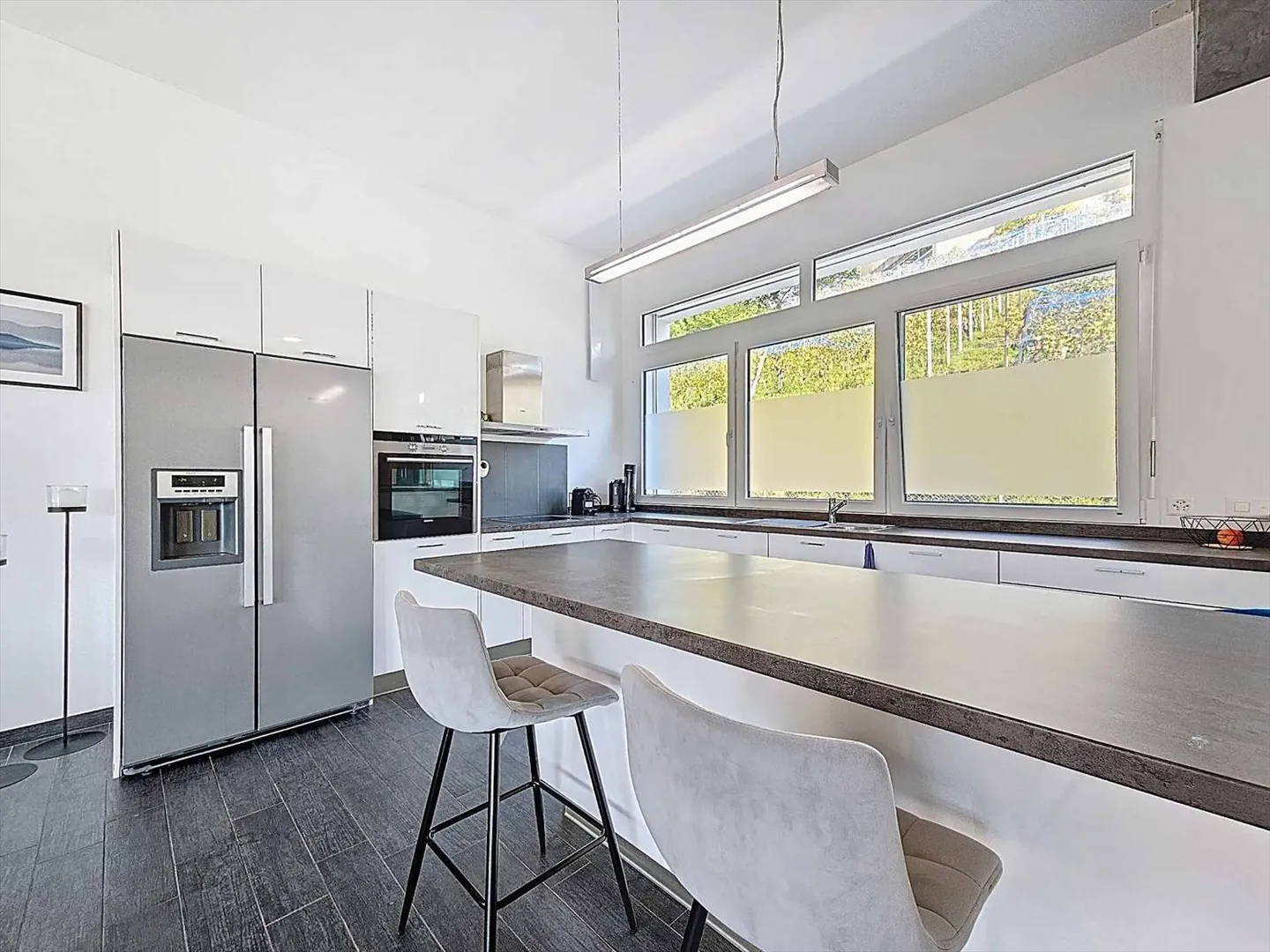 Casa adiacente con 5,5 stanze, giardino e vigneti - Foto 5 di 13