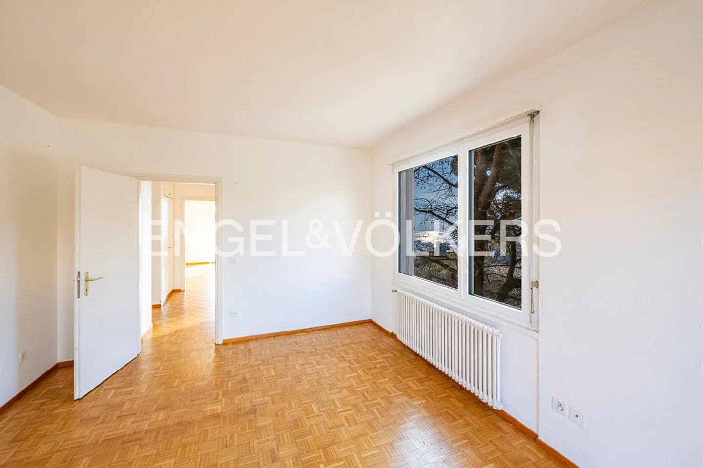 Elegante Wohnung mit Seeblick und privatem Garten - Foto 11 von 13
