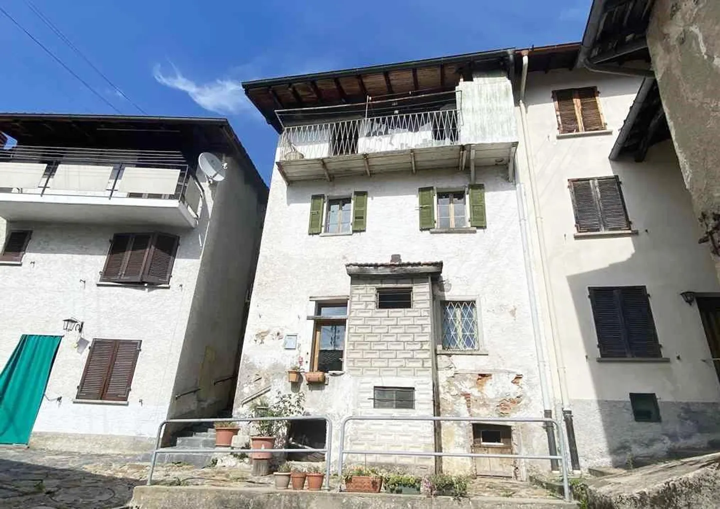 Casa di villaggio 3 1/2 locali con balcone e vista da ampliare - Foto 1 di 15
