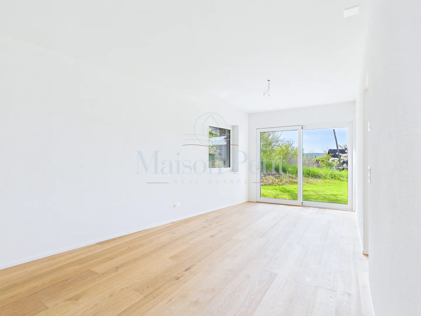 Charmant appartement de jardin 5.5 pièces avec jardin de 336 m² et intimité - Photo 7 sur 11