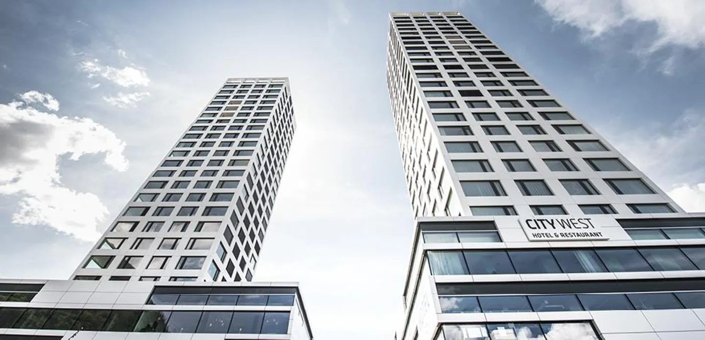 Appartamento soleggiato di 3,5 locali (15° piano) a City West - Foto 1 di 8
