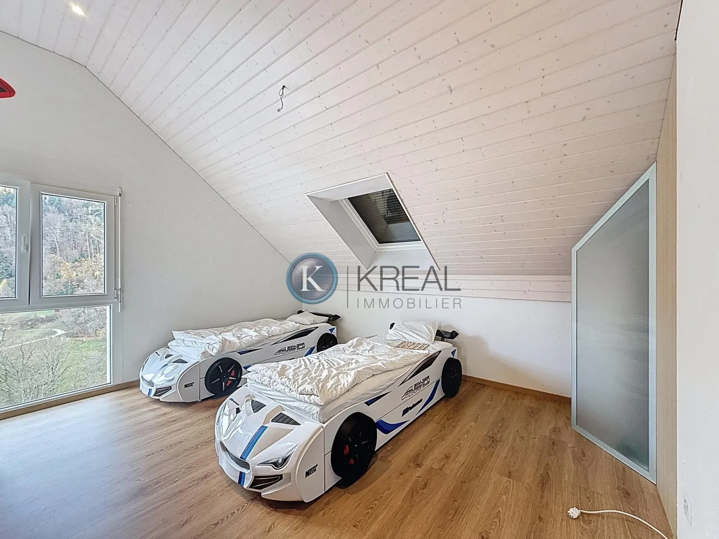 Two-family house with 5.5 rooms in a green environment, 25 minutes from Lausanne - Photo 10 of 13