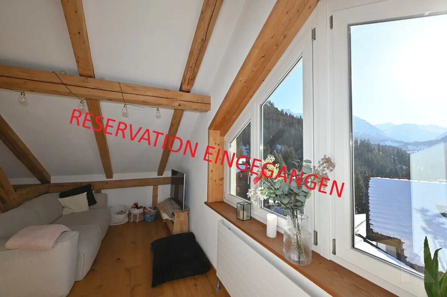 Charmante Dachwohnung in Langwies - Foto 1 von 13