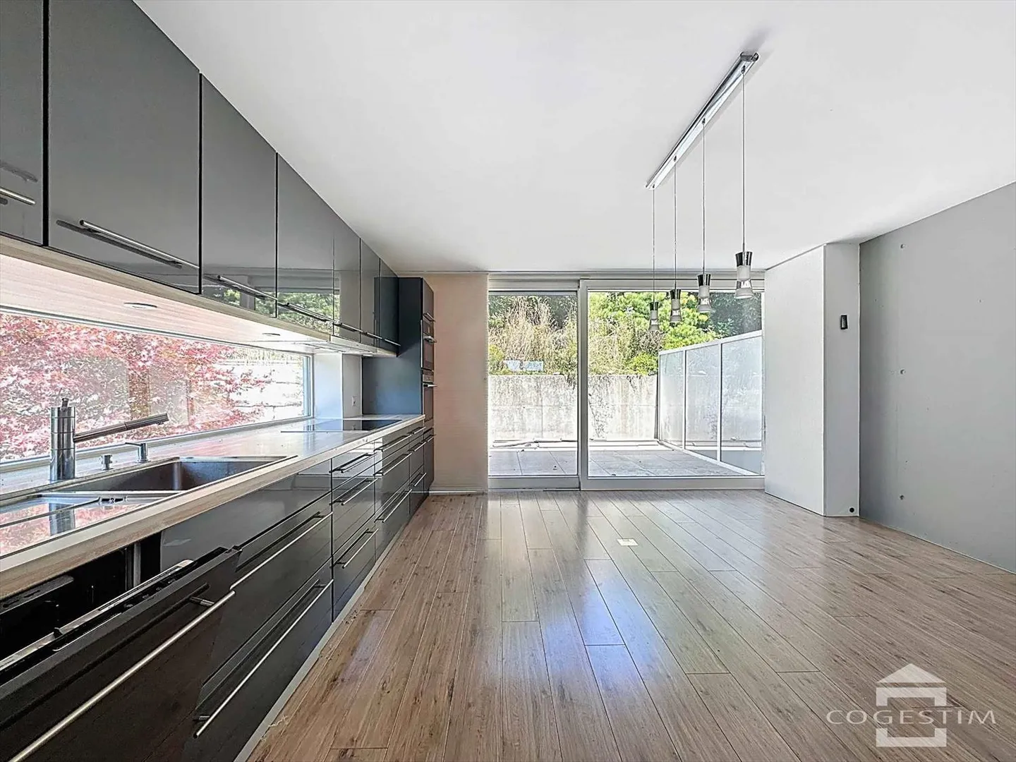 Maison contiguë 5.5 pièces - Photo 3 sur 13