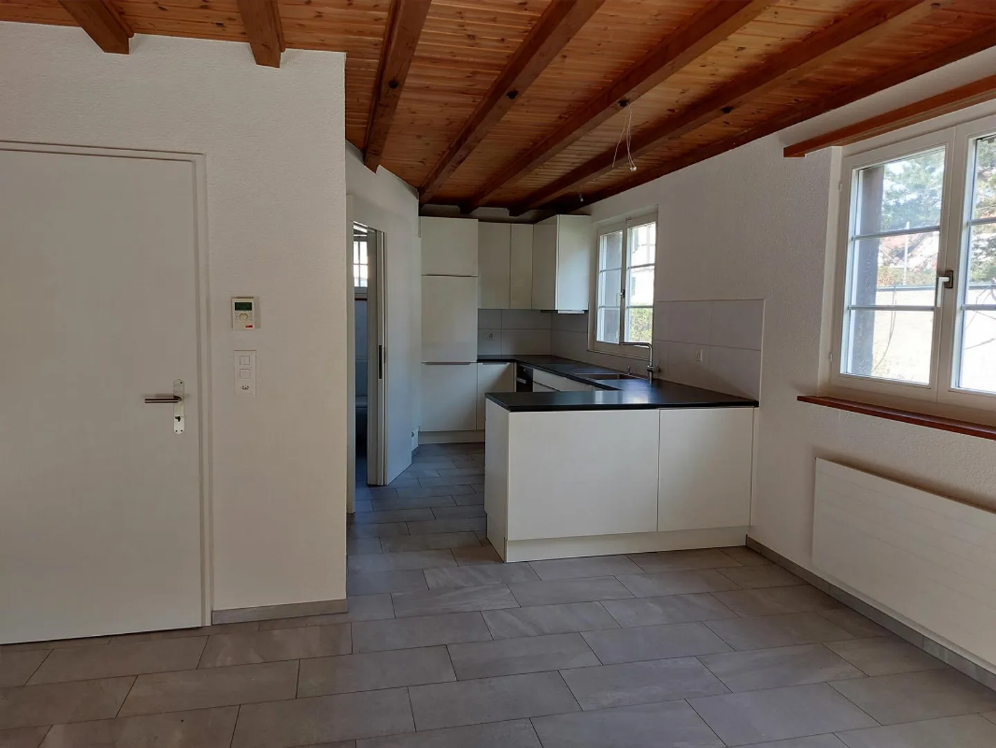 Charmantes Doppelhaus in Allschwil - Foto 3 von 14