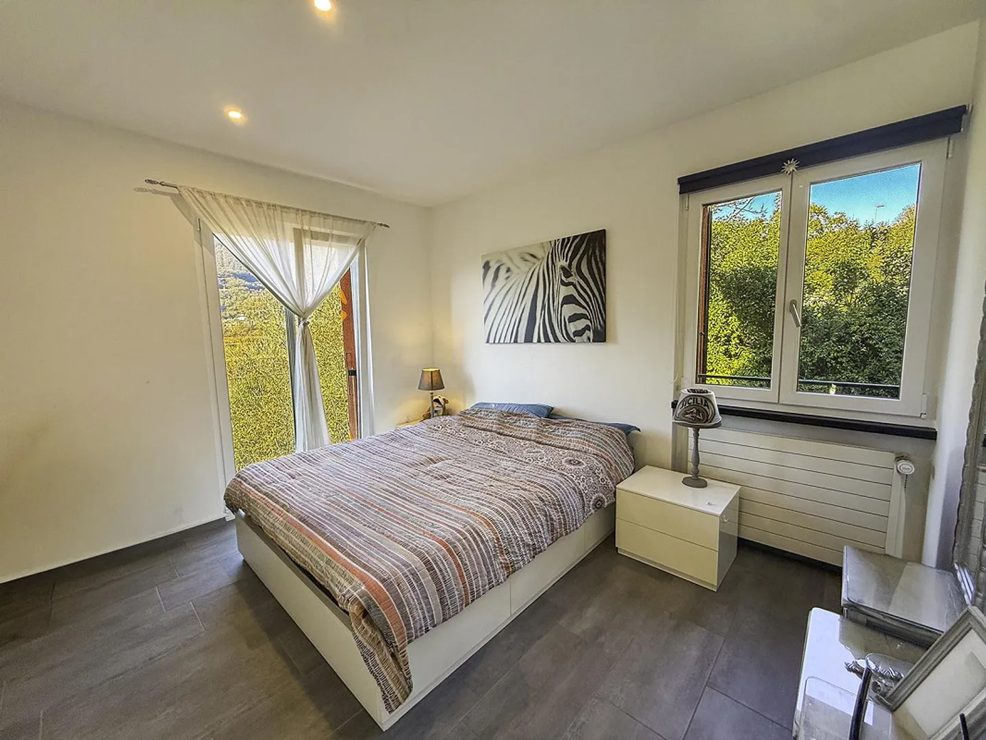 Zweitwohnsitz: 3.5 Zimmer-Wohnung im obersten Stockwerk mit Zugang zur Promenade am Fluss Maggia - Foto 13 von 24