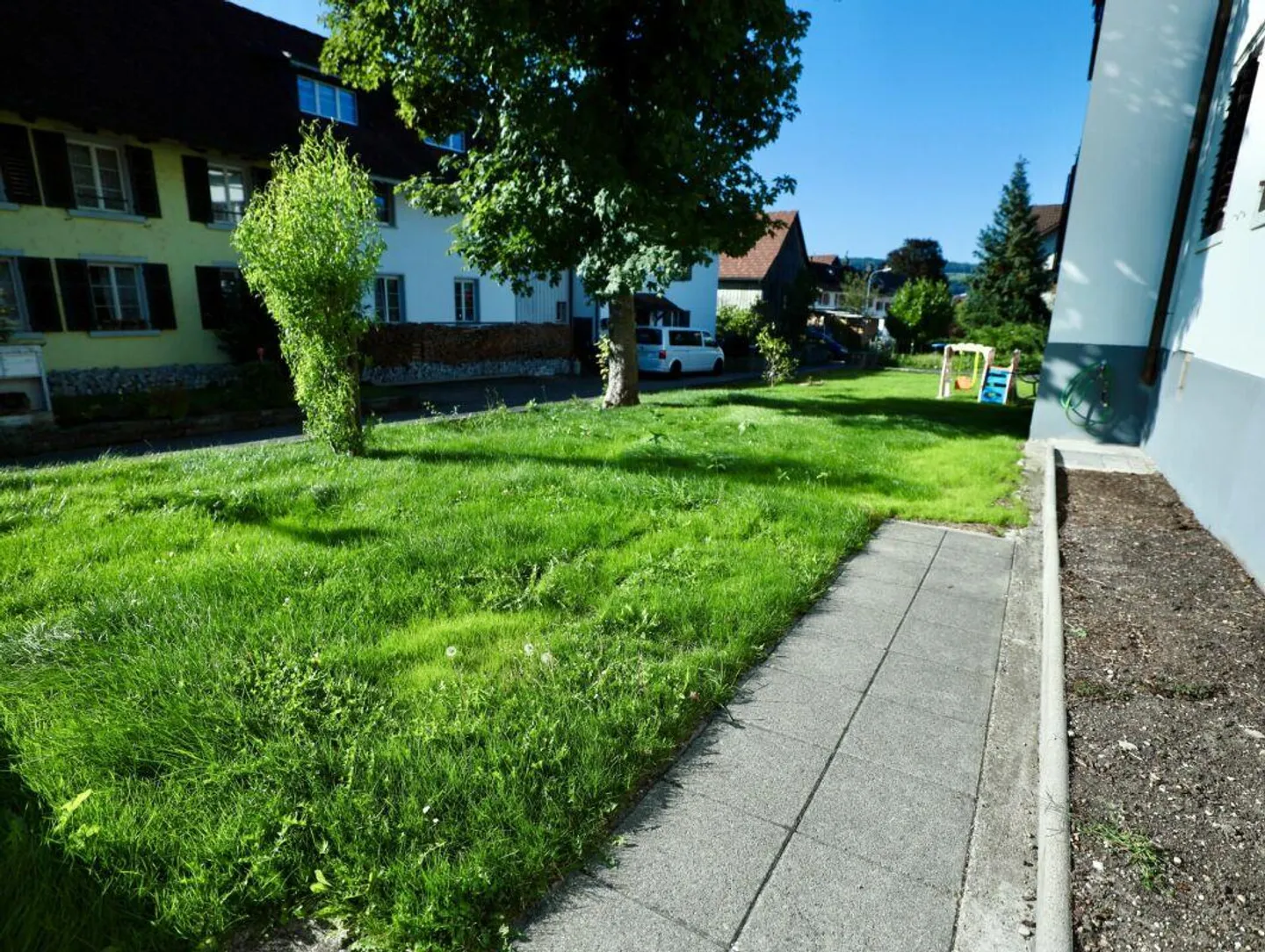 Ideale per famiglie: Appartamento con giardino 4.5 stanze - Foto 11 di 12