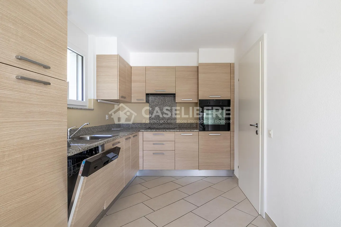 ELEGANT 3.5 ROOMS IN SOLDUNO WITH GARDEN AND OPEN VIEW - Photo 7 of 15