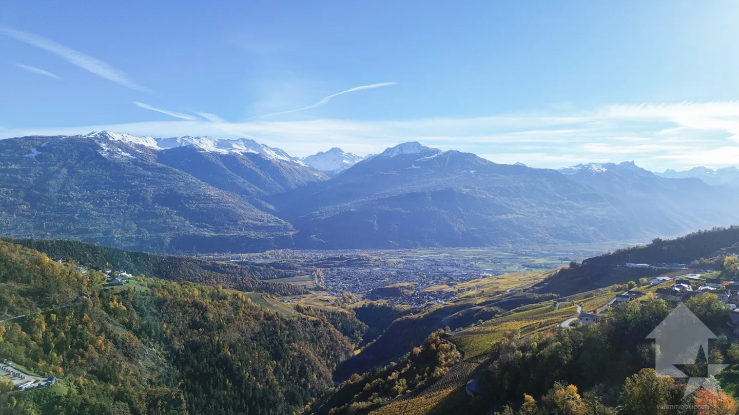 Terrain à bâtir avec vue imprenable dans les hauteurs de Conthey à vendre - Photo 1 sur 8