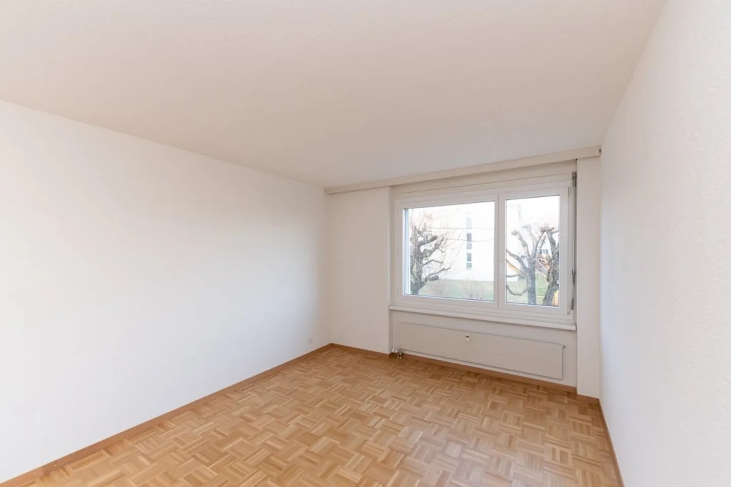 3.5 room apartment on the raised ground floor - Photo 5 of 8