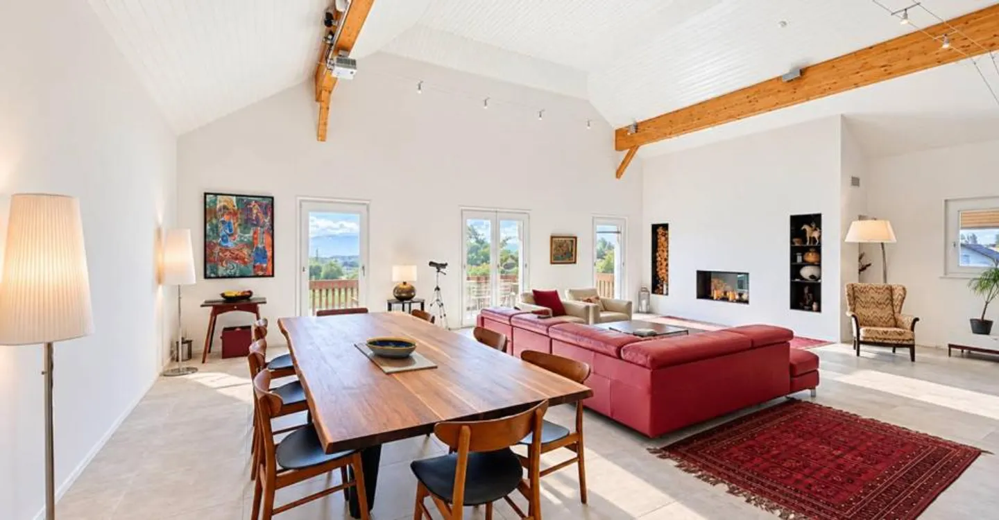 High-Standing Duplex with Lake and Alps View - Photo 1 of 9