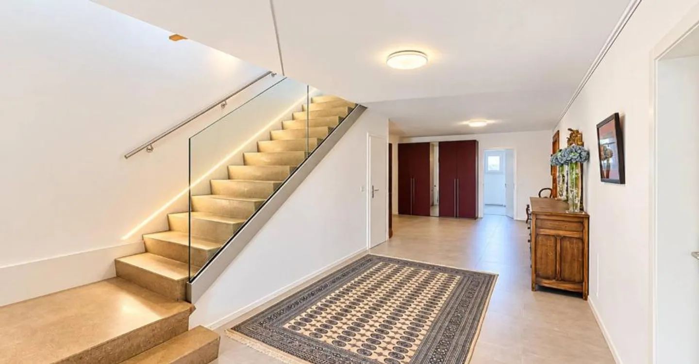 High-Standing Duplex with Lake and Alps View - Photo 4 of 9