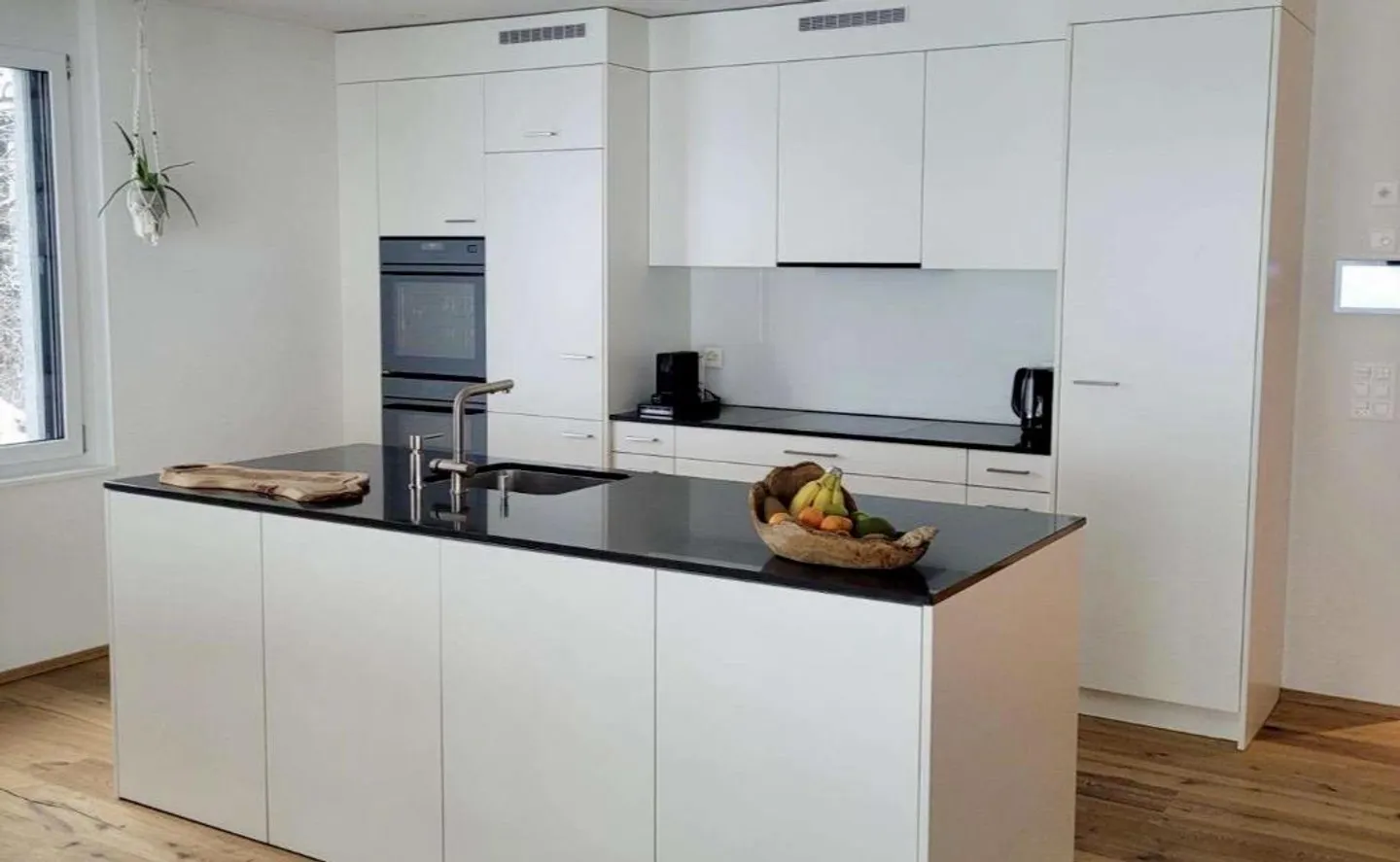 Appartamento al piano terra di 4,5 stanze con patio - Foto 1 di 15