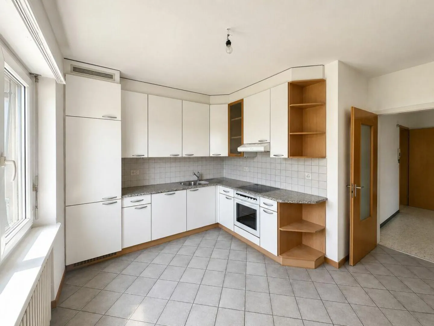 À louer à Novazzano appartement de 3,5 pièces dans une maison bifamiliale avec grande terrasse et accès direct au jardin - Photo 7 sur 11