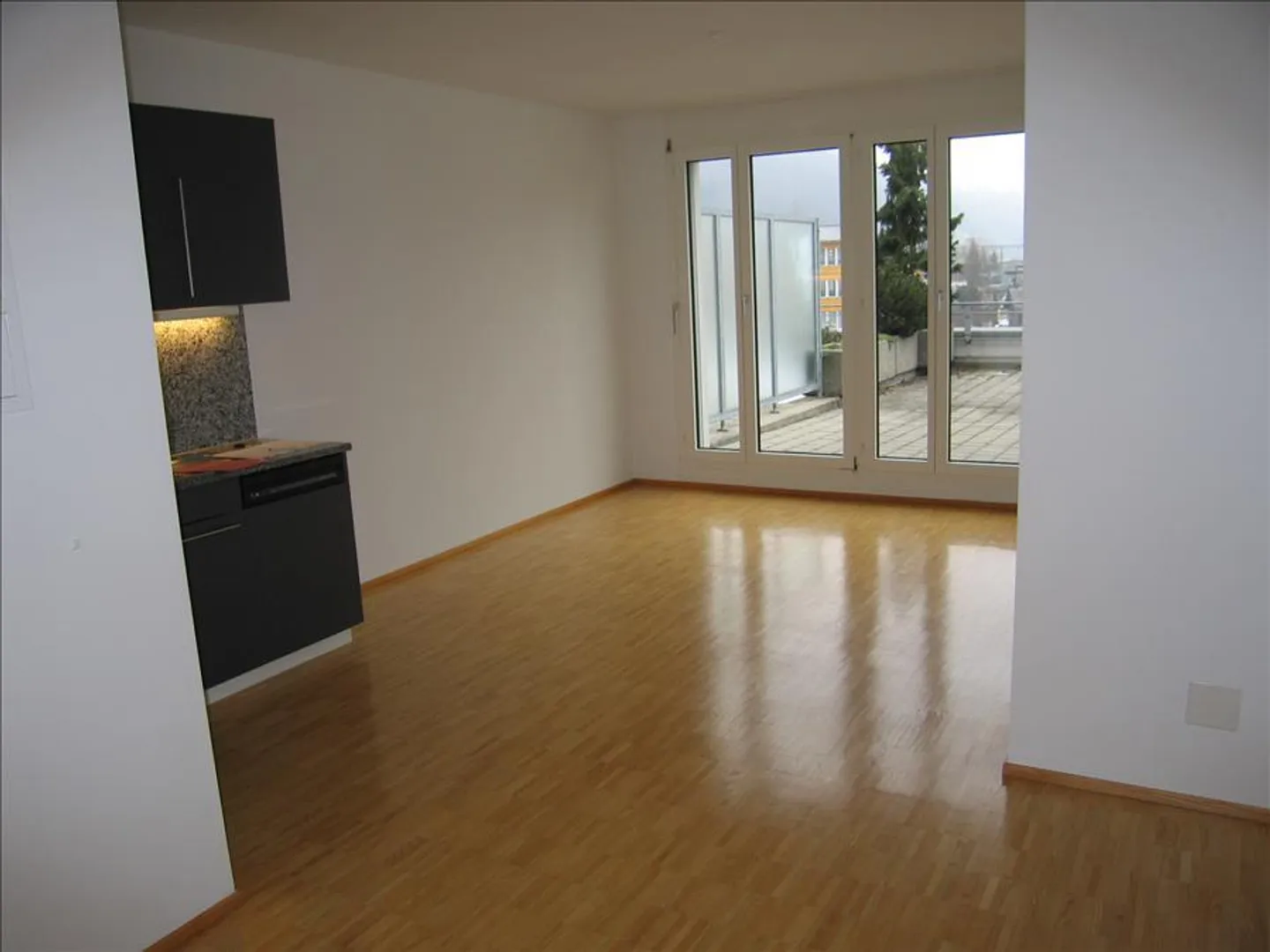 Charmante Wohnung mit Grosser Terrasse - Foto 2 von 7
