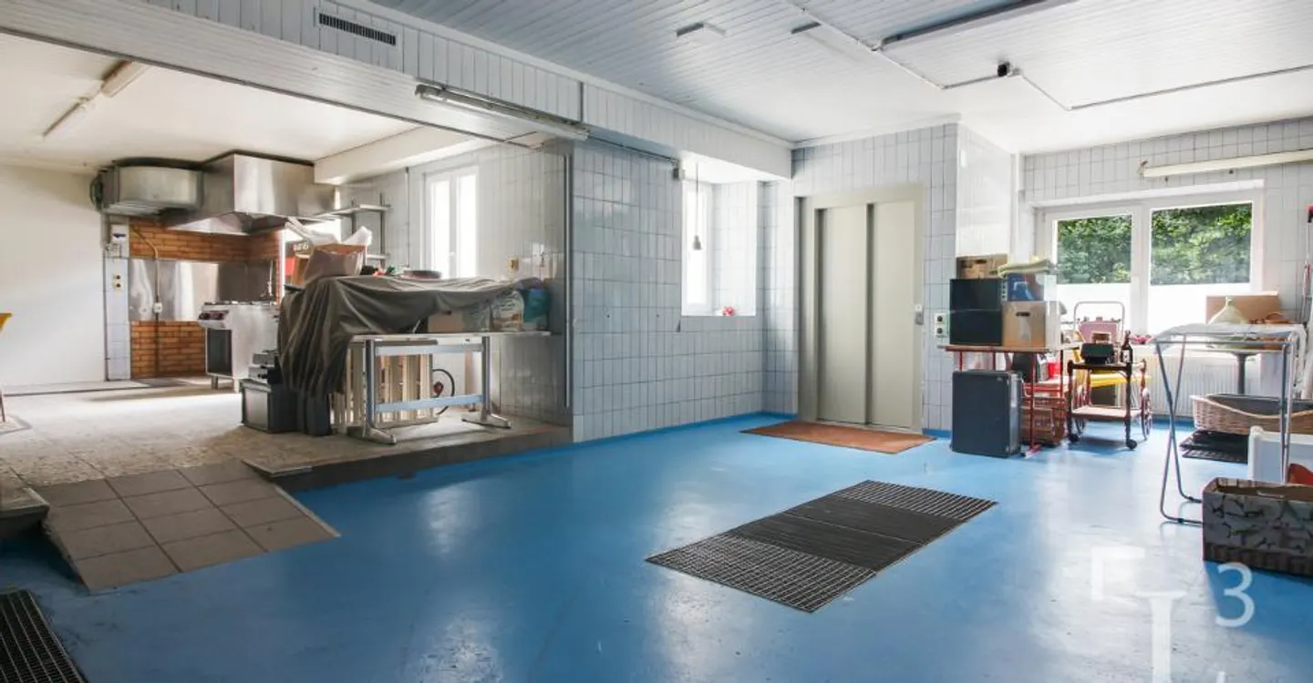 Mixed-use building with commercial space and apartments - Photo 9 of 12