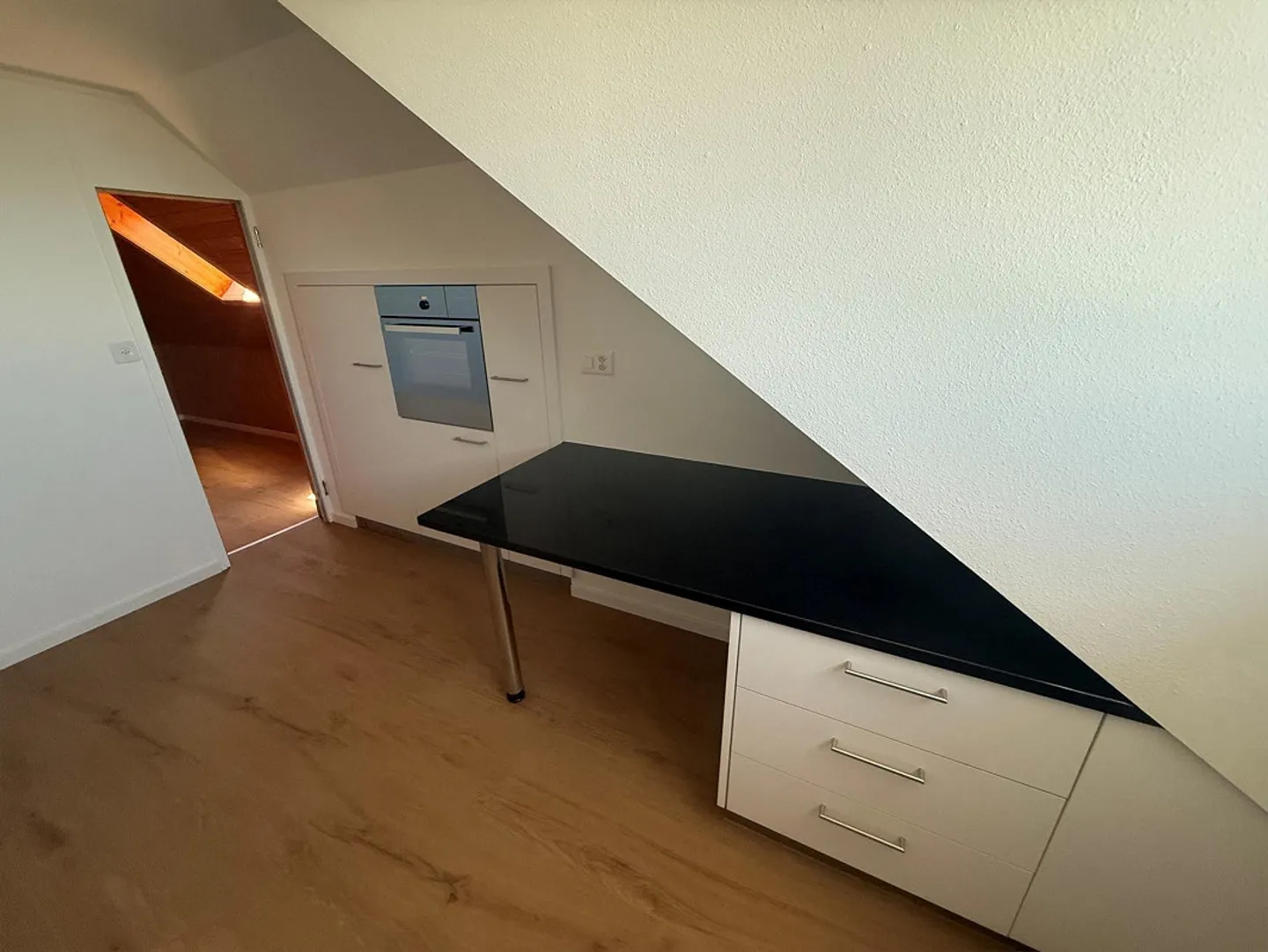 Appartement sous les combles de 1,5 pièce au 3ème étage - Photo 3 sur 8