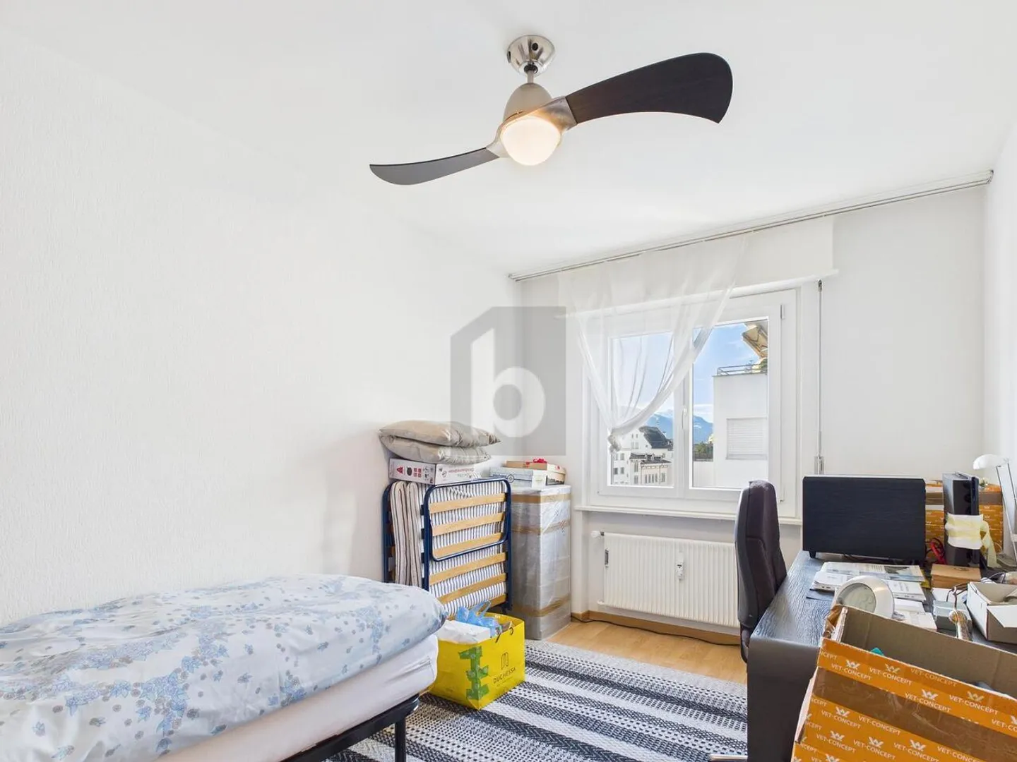 Appartement spacieux en ville - Photo 5 sur 6