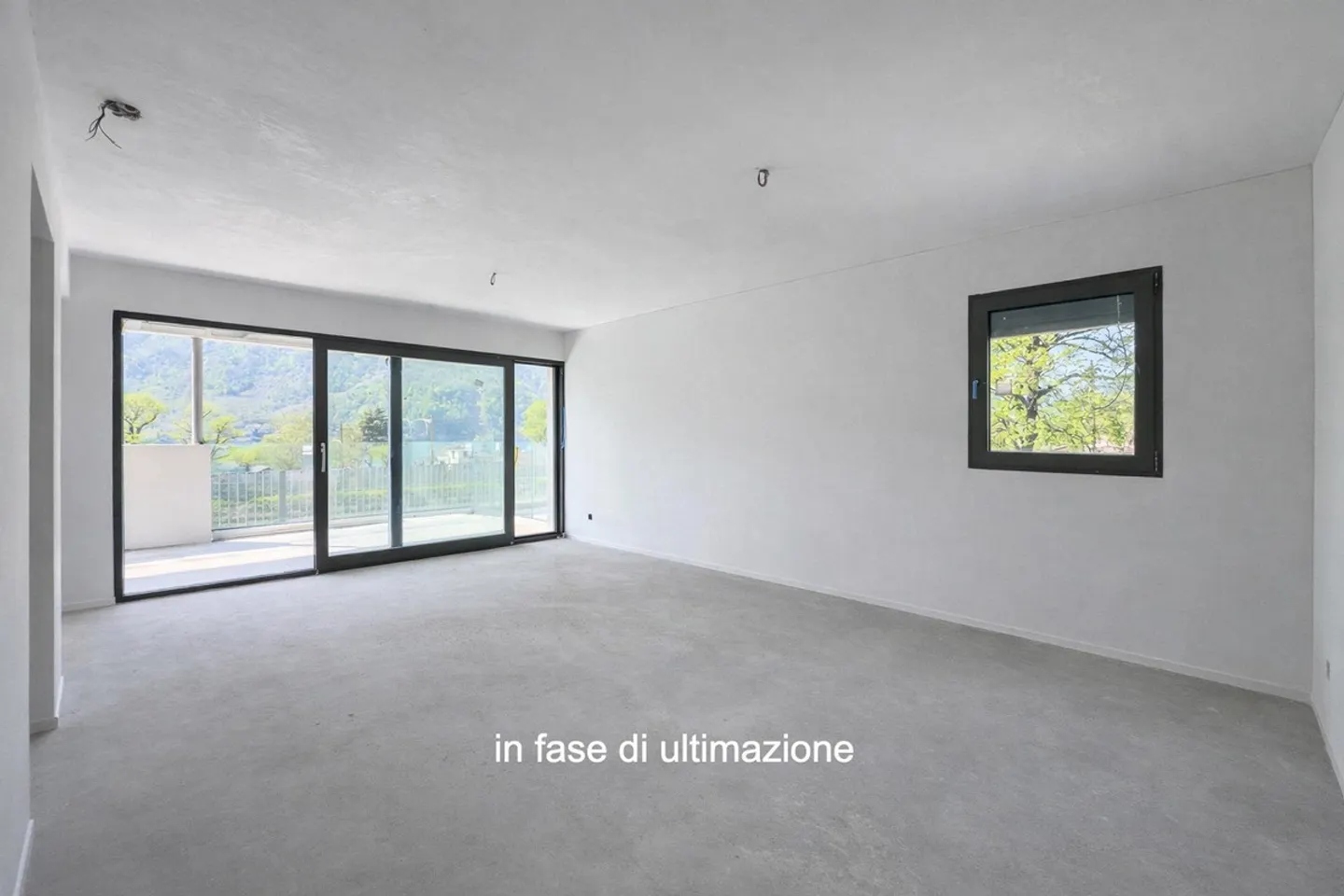 Modern and new 3.5 room duplex with garden in Melano - Photo 2 of 7