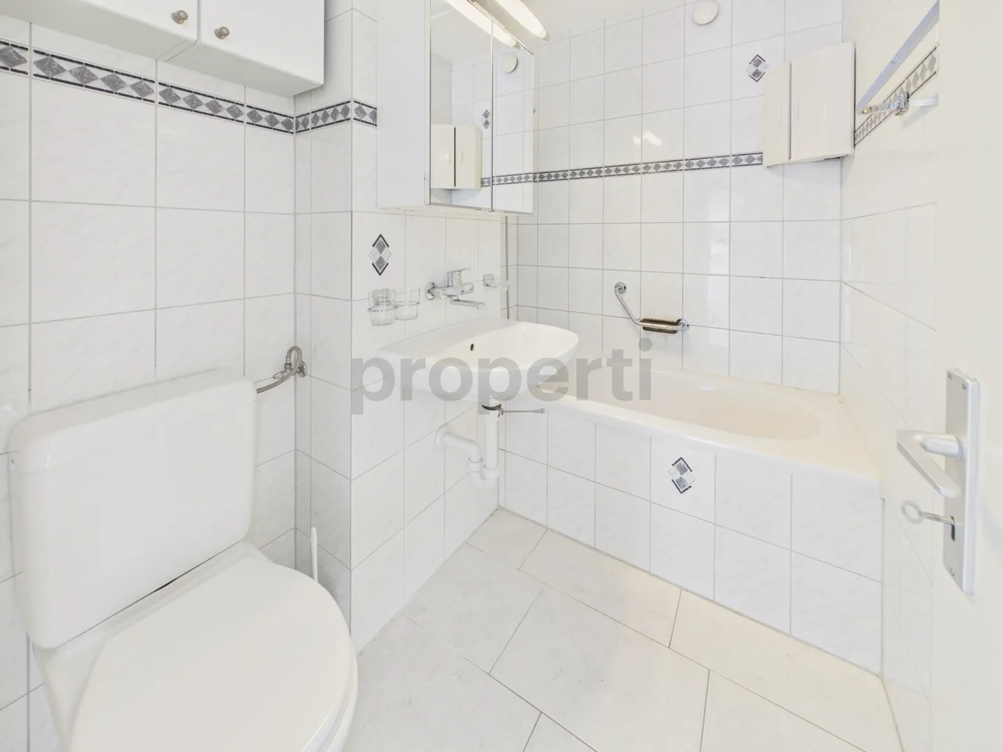 Appartement rénové avec balcon - Photo 10 sur 13
