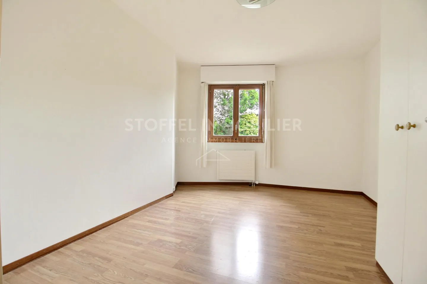 Appartement spacieux avec jardin - Photo 7 sur 12