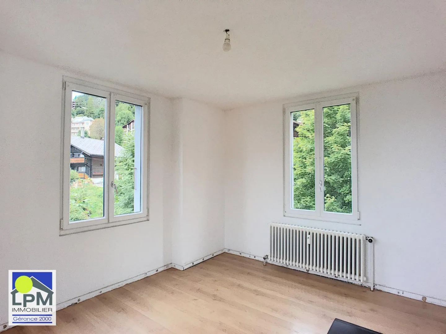 Charmant appartement 2.5 pièces - Photo 4 sur 4