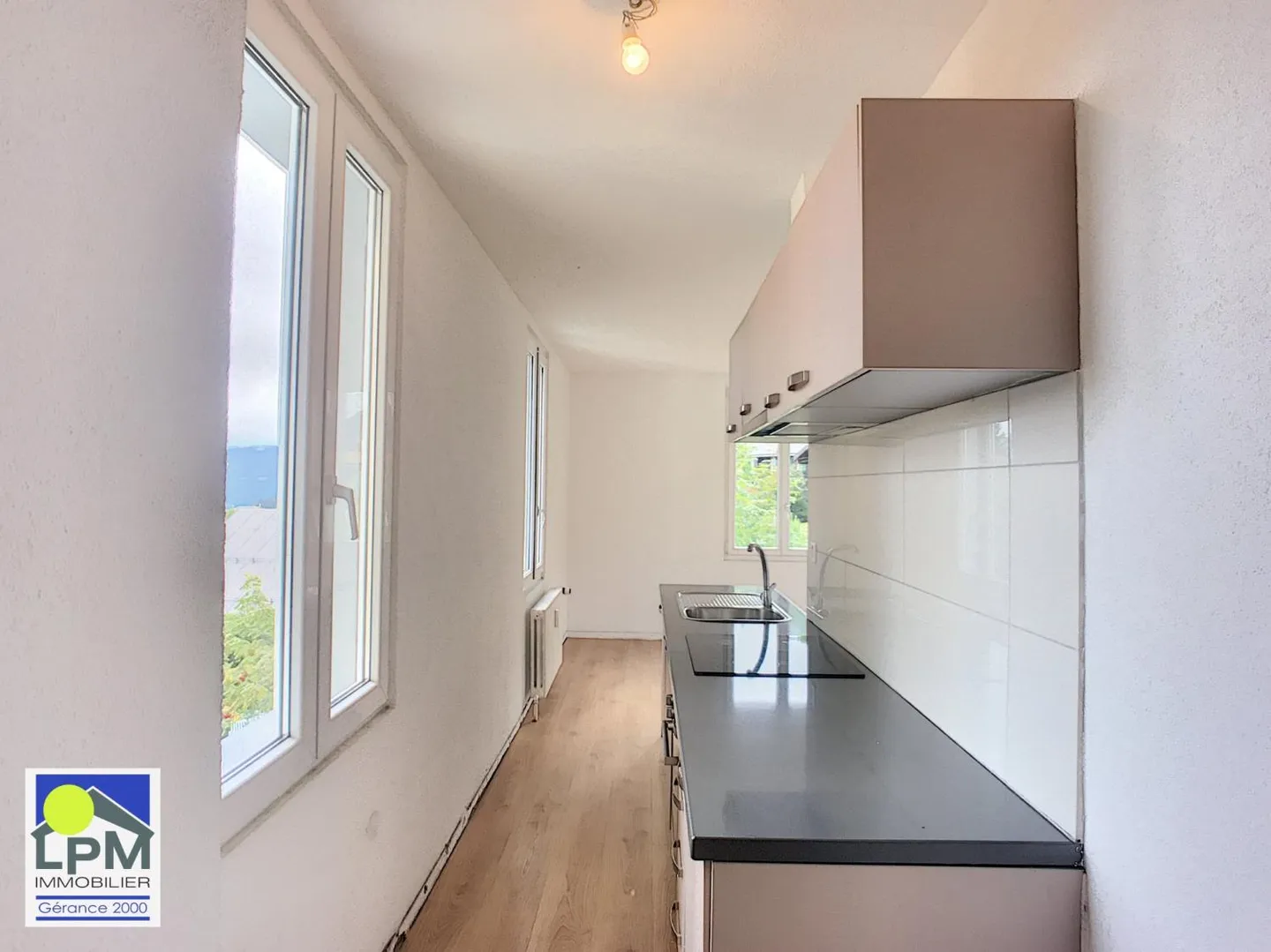 Charmant appartement 2.5 pièces - Photo 2 sur 4