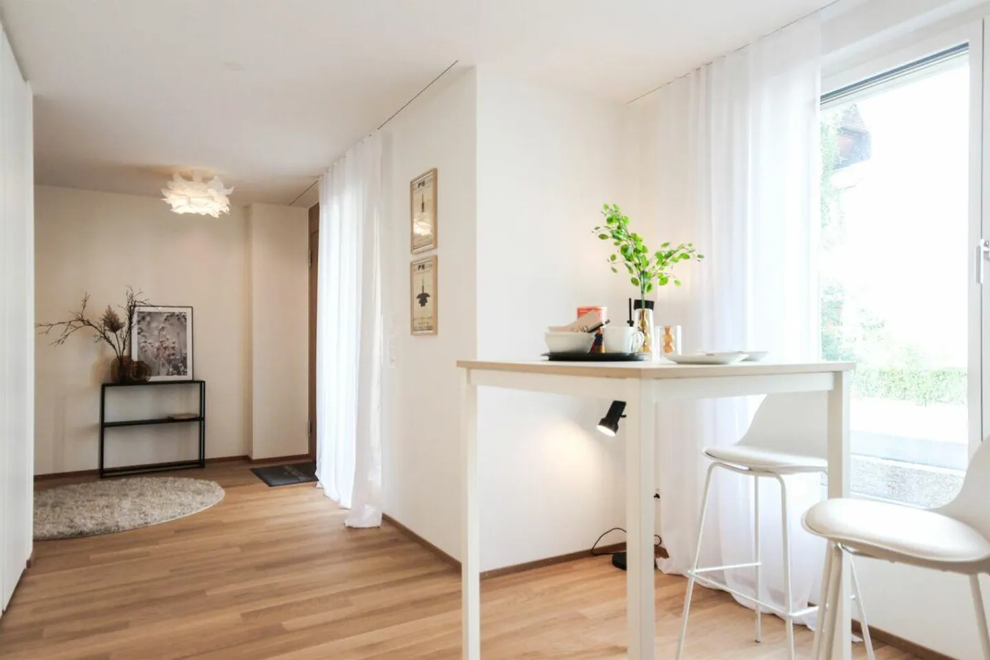 Charmante Maisonettewohnung mit eigenem Garten im Herzen von Reinach - Foto 4 von 9