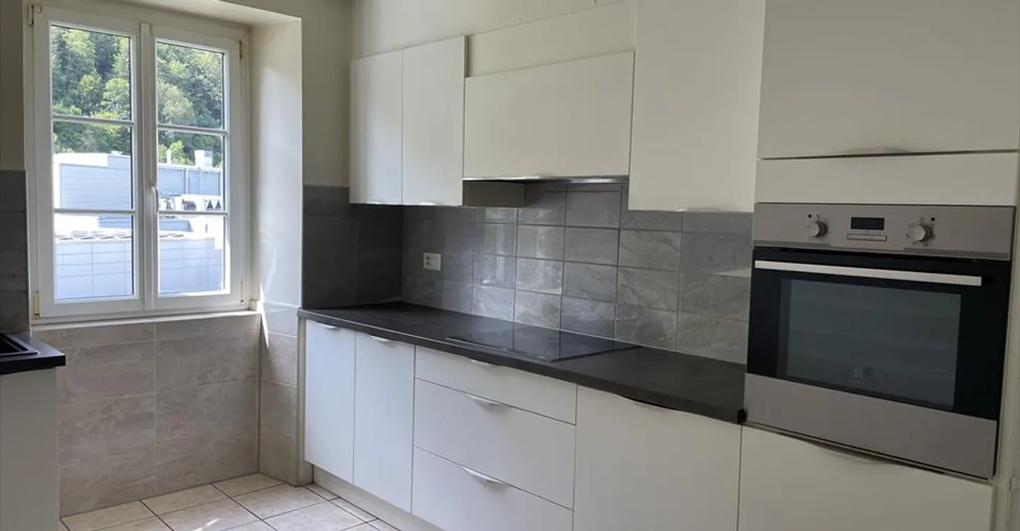 Appartement Charmant - Photo 2 sur 4