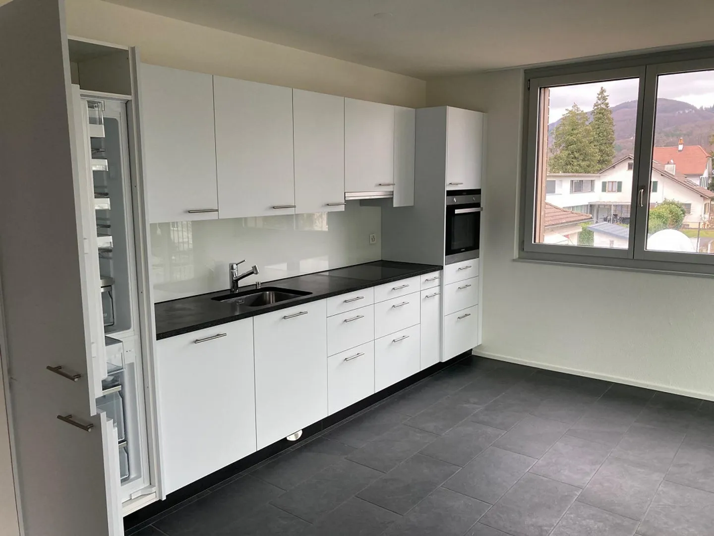 Moderne Wohnung mit Wintergarten - Foto 3 von 15