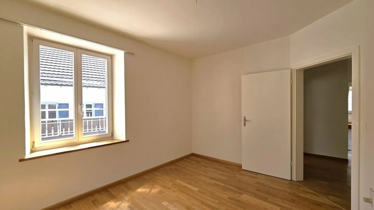 Heimelige Maisonettewohnung mit Terrasse und Garage - Foto 7 von 13