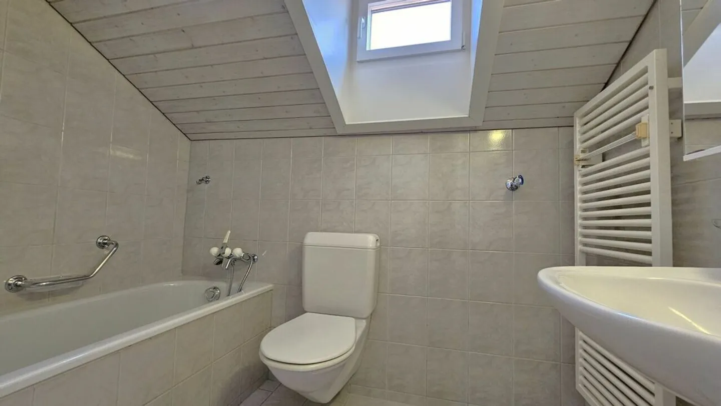 Heimelige Maisonettewohnung mit Terrasse und Garage - Foto 12 von 13