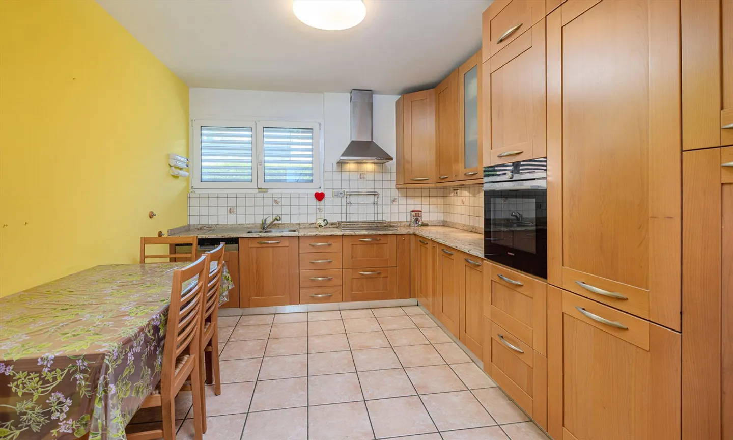 Maison individuelle lumineuse 5.5 avec grand jardin privé à Bioggio - Photo 4 sur 12