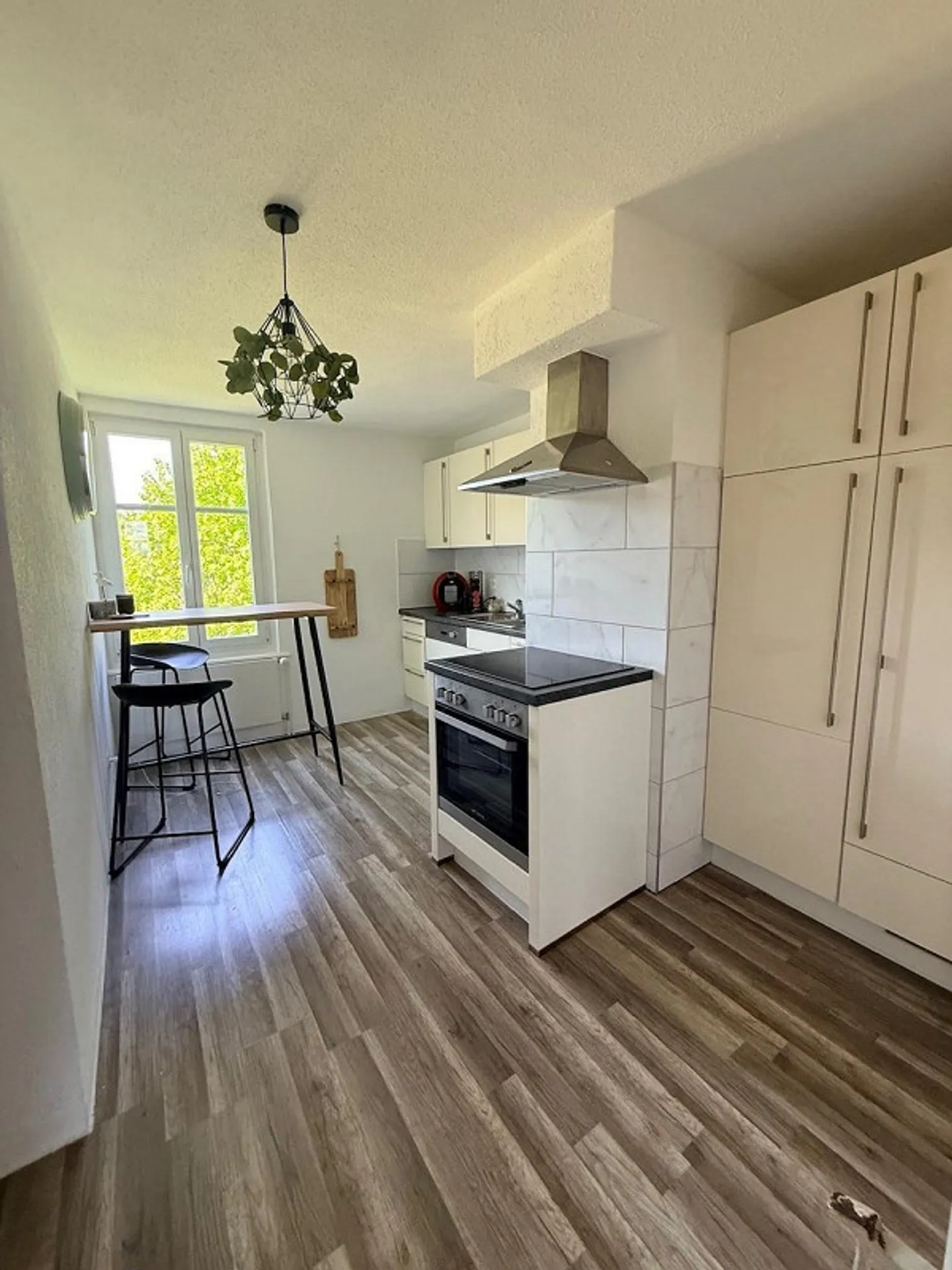 Charmante Dachgeschosswohnung mit Seesicht - Foto 4 von 10