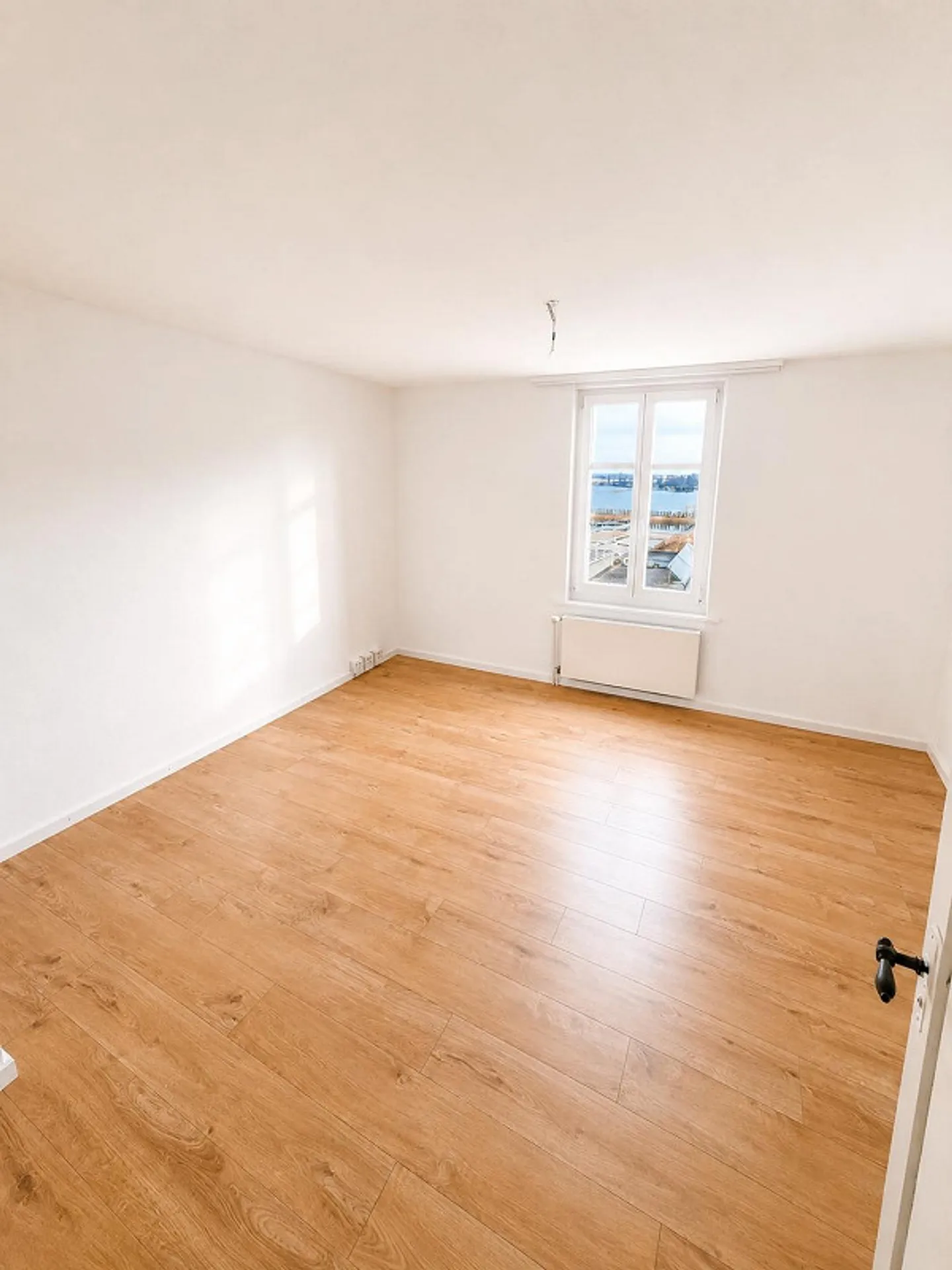 Charmante Dachgeschosswohnung mit Seesicht - Foto 8 von 10