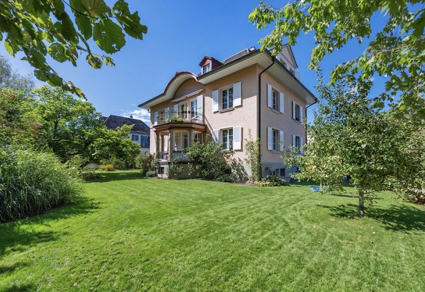A multi-family house with character and idyllic garden area - Photo 2 of 22