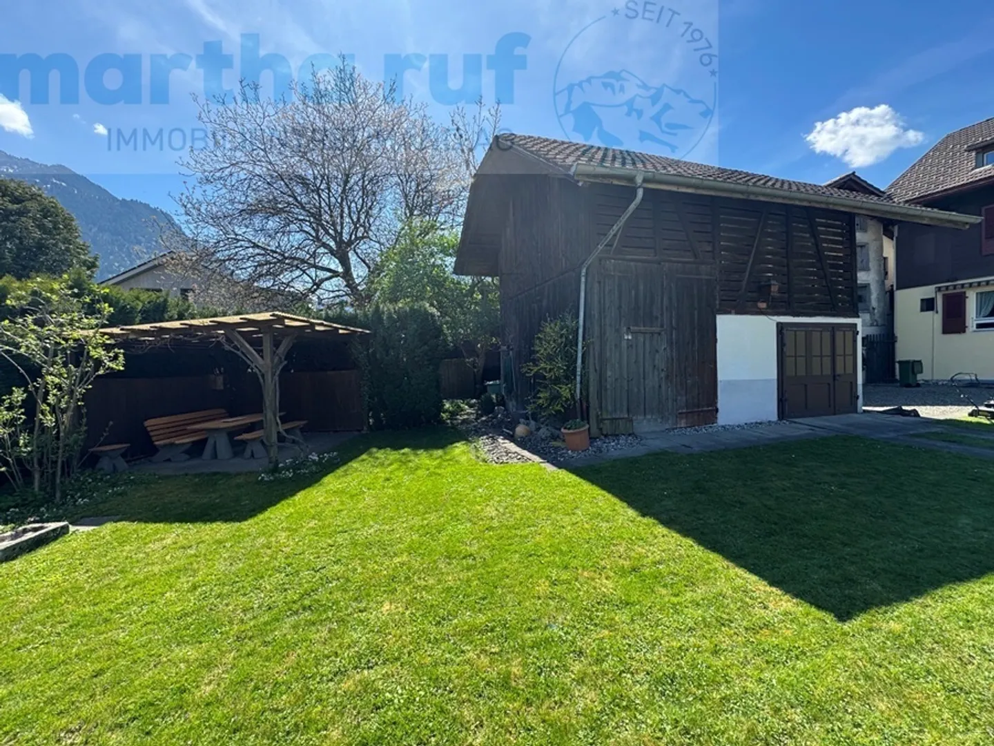 Multi-family house with 3 units, barn and large garden - Photo 18 of 22