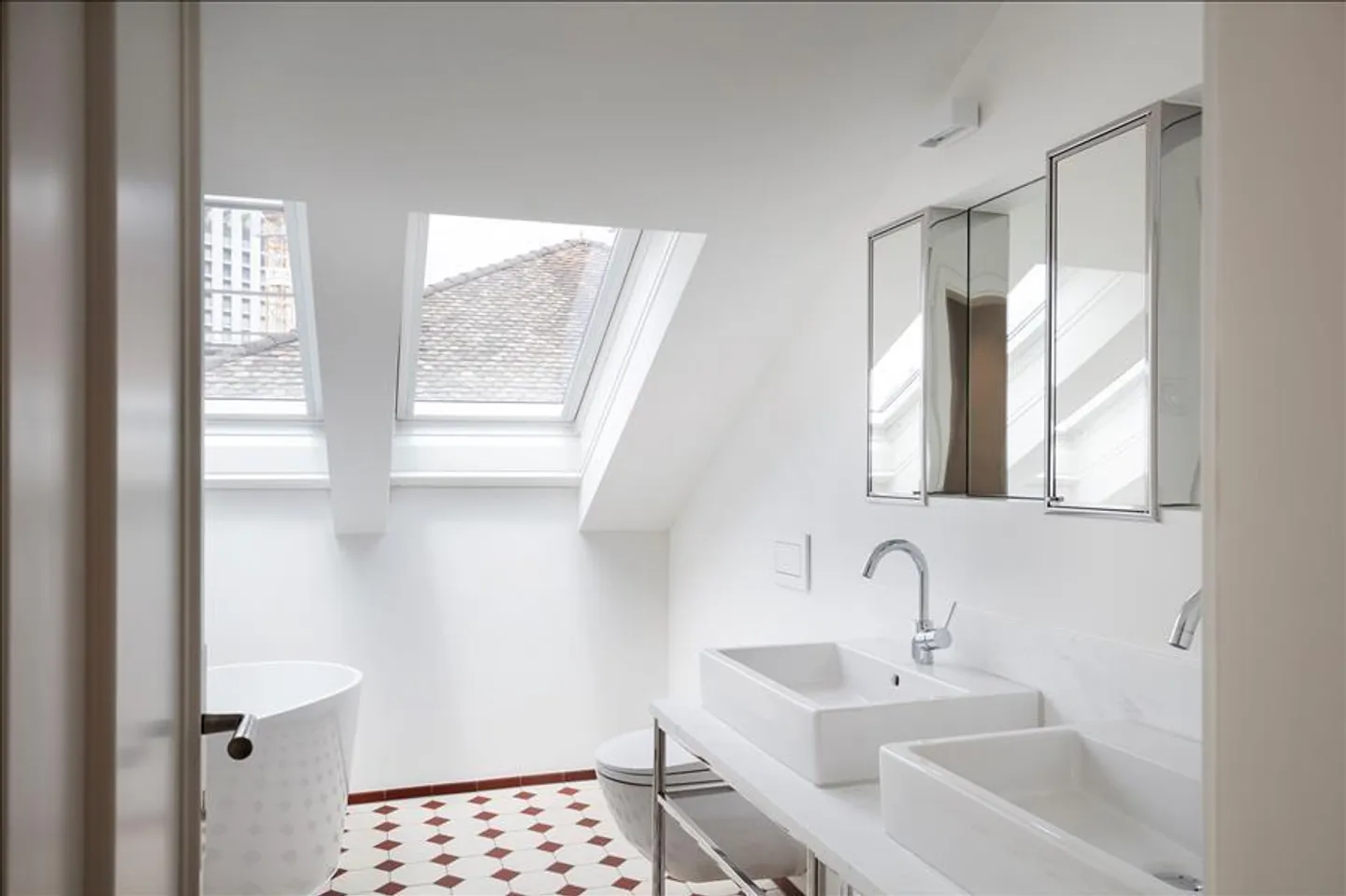 Appartement en attique avec rooftop privé - Photo 10 sur 10