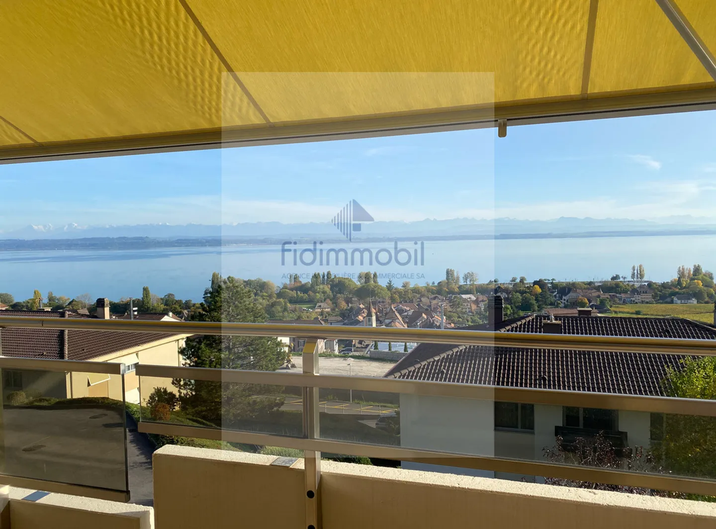 COMPLETELY RENOVATED APARTMENT WITH UNOBSTRUCTED VIEW OF THE LAKE - Photo 2 of 10