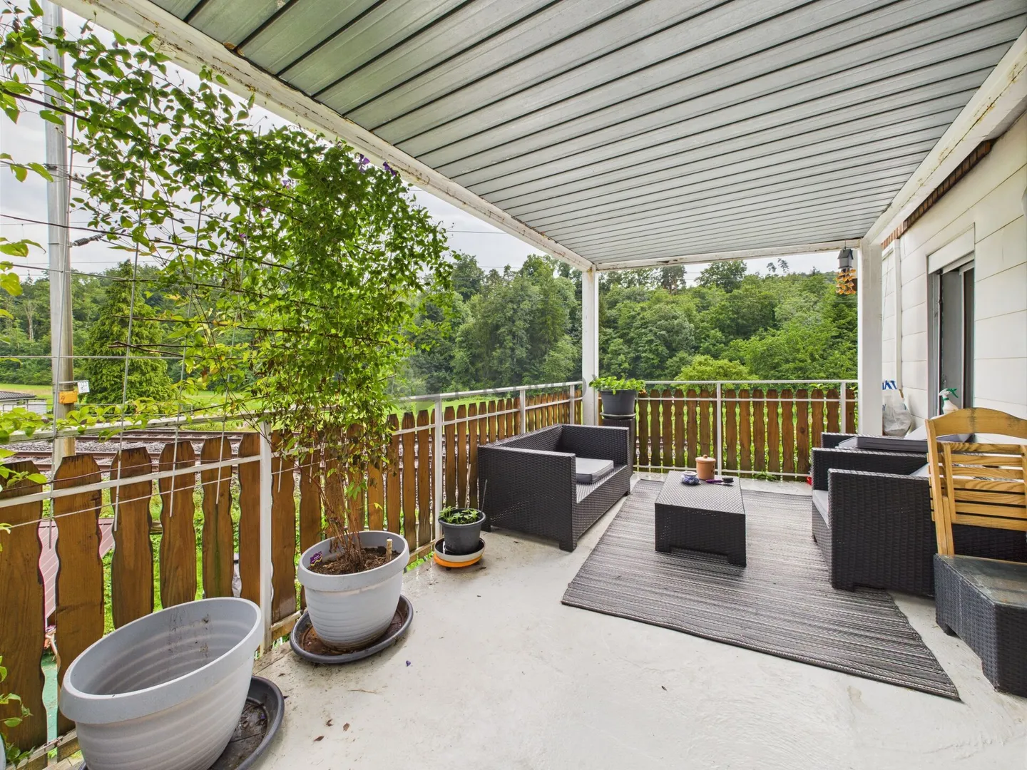 Section de maison généreuse rencontre rendement - Immeuble multifamilial avec atelier et 4,97 % de rendement brut - Photo 2 sur 13