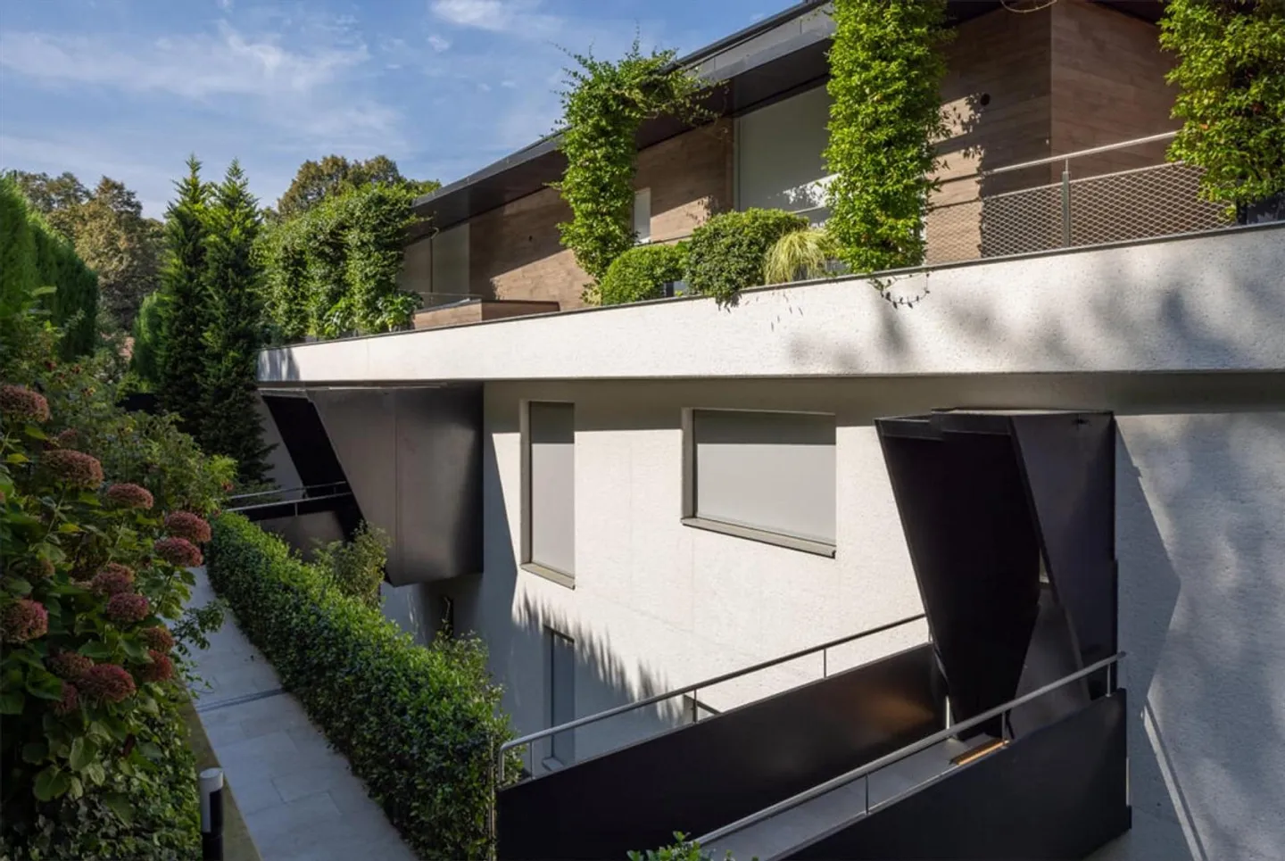 Appartamento elegante con 3,5 stanze e giardino privato in una residenza prestigiosa - Foto 1 di 12