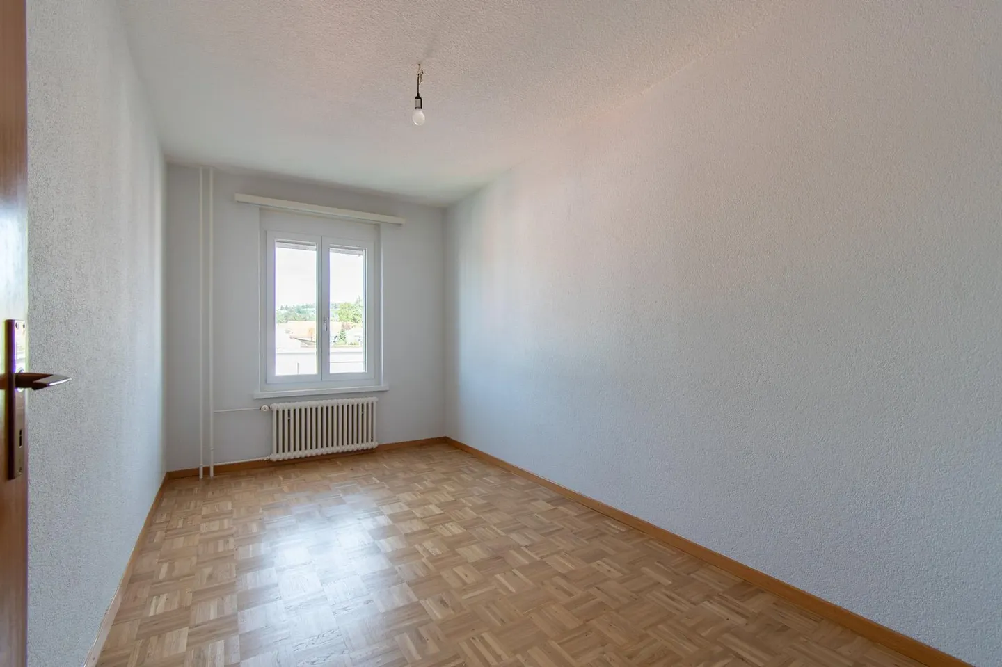 Charming 4.5-room apartment in a quiet, central location, near the cantonal hospital - Photo 10 of 13