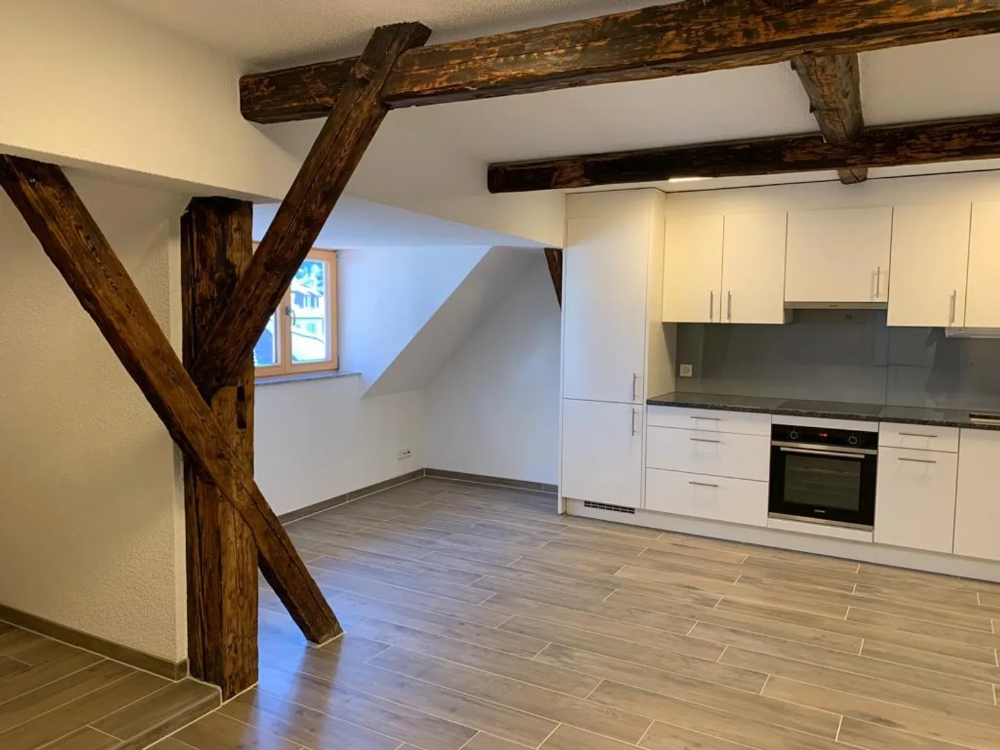 Charmante 2.5-Zimmer-Dachwohnung in der Alten Probstei, Bad Zurzach - Foto 1 von 17