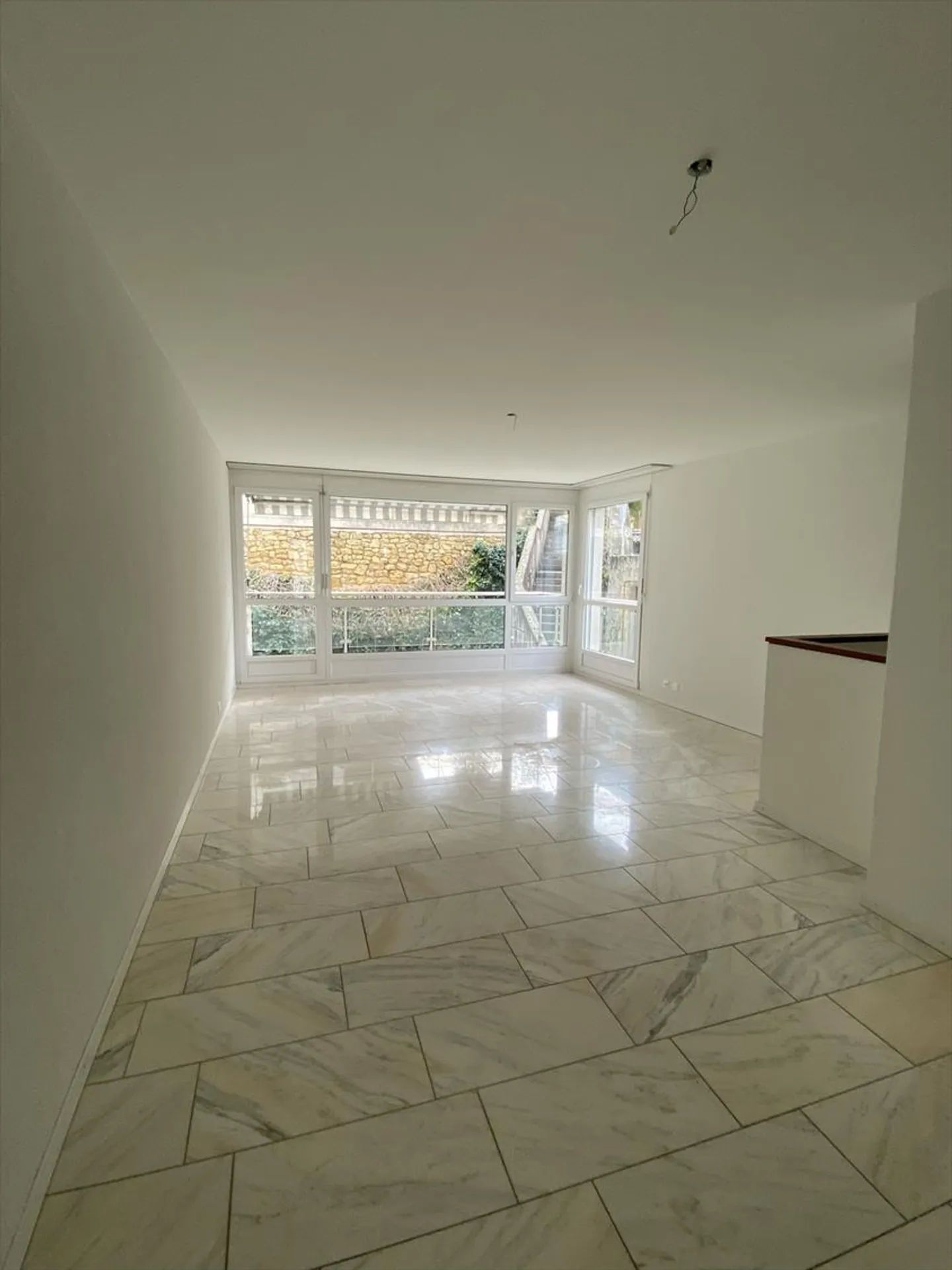 Appartement en duplex de 3,5 pièces - Photo 2 sur 9