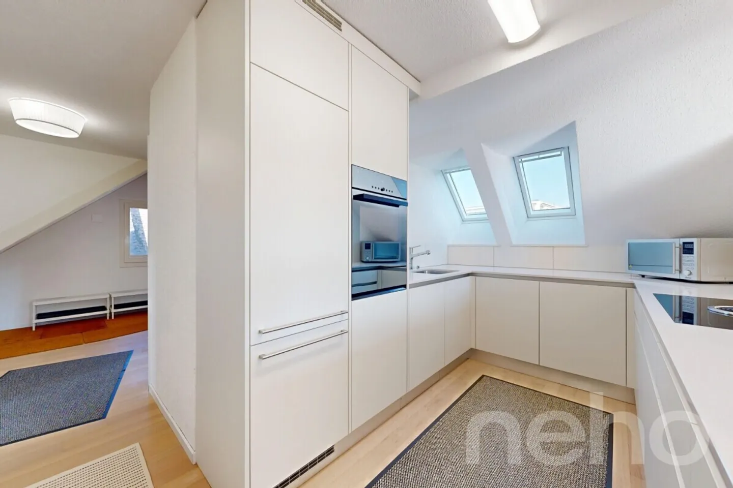 Light-flooded penthouse duplex in a quiet location in Zurich-Witikon - Photo 4 of 12