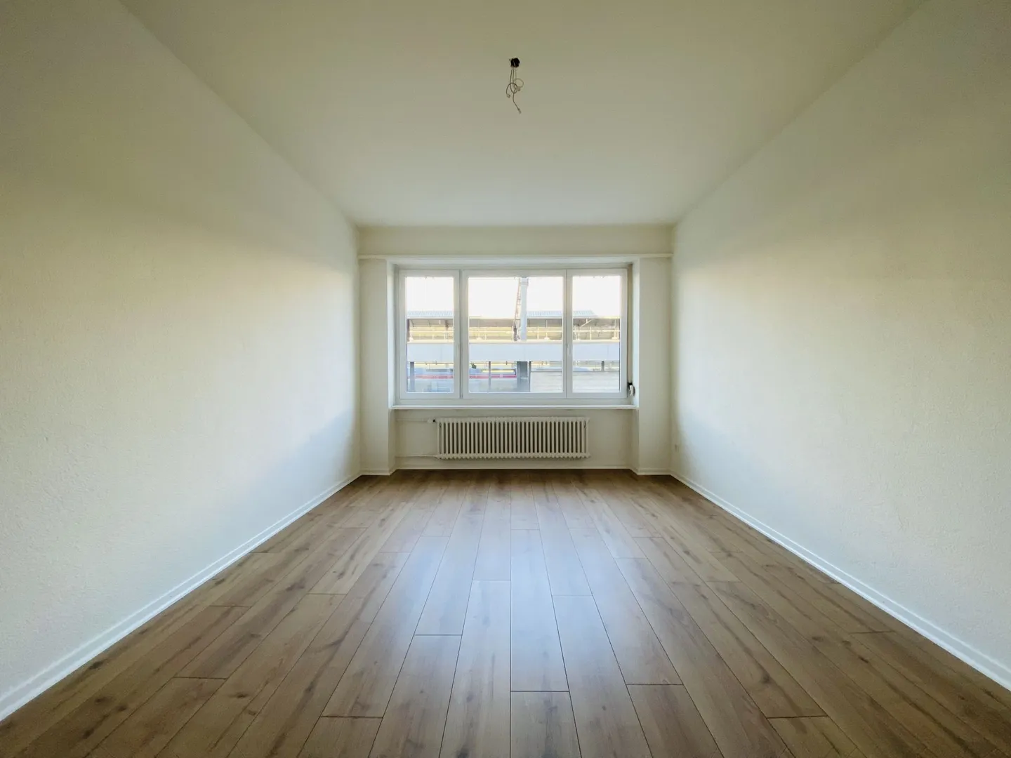 Second occupancy 2.5-room apartment with balcony and cellar (1001) - Photo 5 of 12