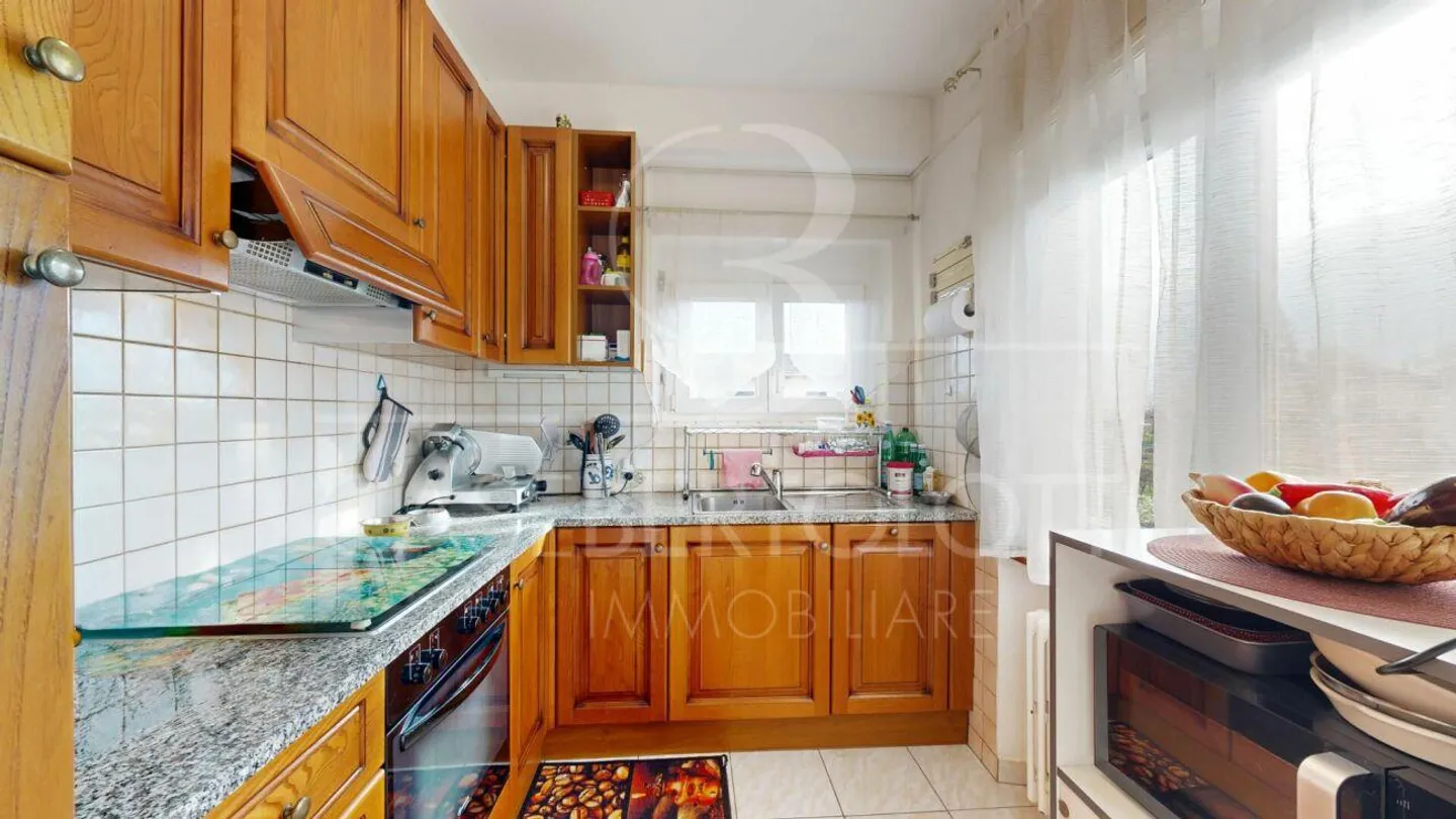 Charming multi-family building with two residential units and accessory building - Photo 8 of 12